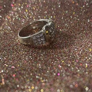 Sterling silver belt shaped ring with purple stones